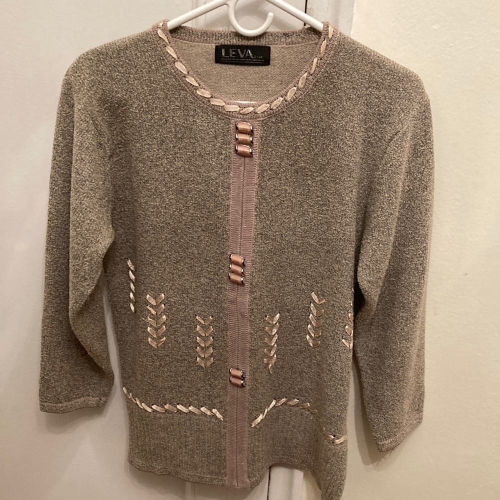 Women tops. Size M. Made in China. Tan color.